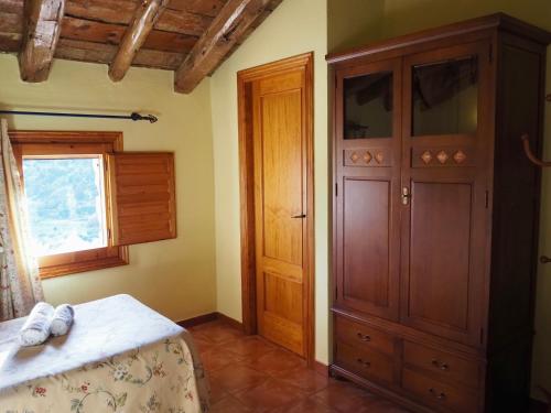 Postel nebo postele na pokoji v ubytování La Ontina Alojamientos Rurales