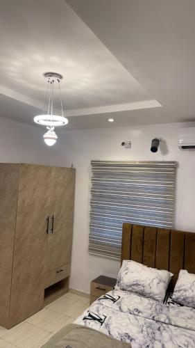 Postel nebo postele na pokoji v ubytování Oluremilekun The home of beauty and fun