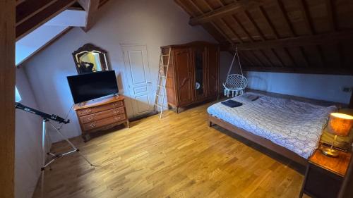 Postel nebo postele na pokoji v ubytování Corps de ferme bourguignon