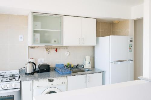 O bucătărie sau chicinetă la J Y C Apart