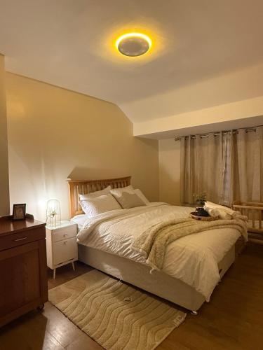 a bedroom with a large bed with aokedokedokedoked at Grand Haven Dudley in Dudley