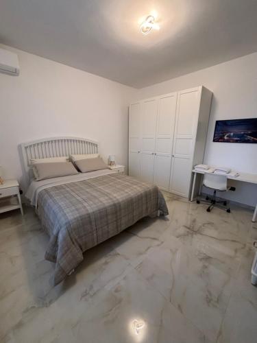 Ένα ή περισσότερα κρεβάτια σε δωμάτιο στο a&g partenope