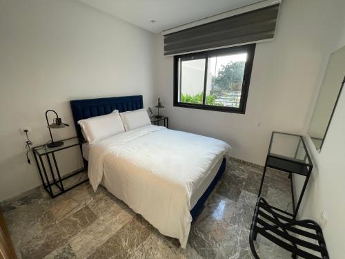 Postel nebo postele na pokoji v ubytování Appartement neuf luxe OLM Aviation à Rabat