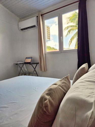 Postel nebo postele na pokoji v ubytování Maison Zoé