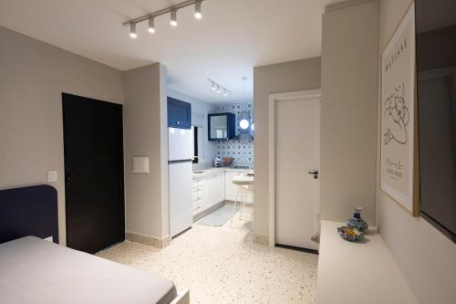 Postel nebo postele na pokoji v ubytování 112-Studio completo e charmoso prox a UEL