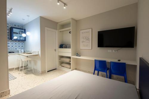 TV a/nebo společenská místnost v ubytování 112-Studio completo e charmoso prox a UEL