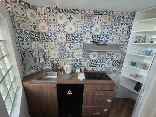 Η κουζίνα ή μικρή κουζίνα στο La Maison San LaZaro