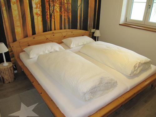 Postelja oz. postelje v sobi nastanitve Claudis Ferienhäusle
