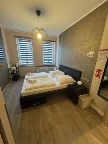 a bedroom with a large bed in a room at Suite-Pauli in Hamburg