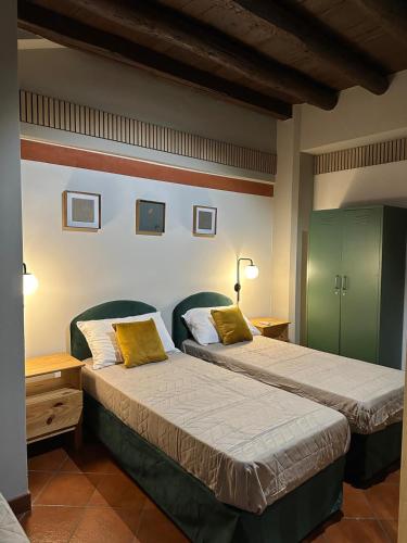 Postel nebo postele na pokoji v ubytování La Galdina - NEW LOFT X 3