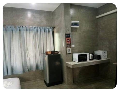 Η κουζίνα ή μικρή κουζίνα στο P&P at Pai