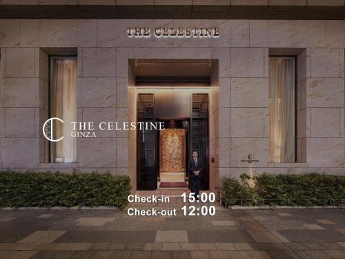 a man standing in the doorway of a building at Hotel The Celestine Ginza in Tokyo