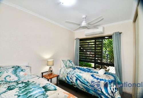 Postel nebo postele na pokoji v ubytování 17 Banksia Court