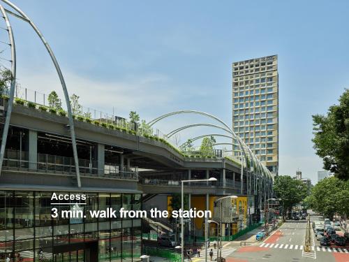 a building with a walkway on top of it at sequence MIYASHITA PARK - Shibuya in Tokyo