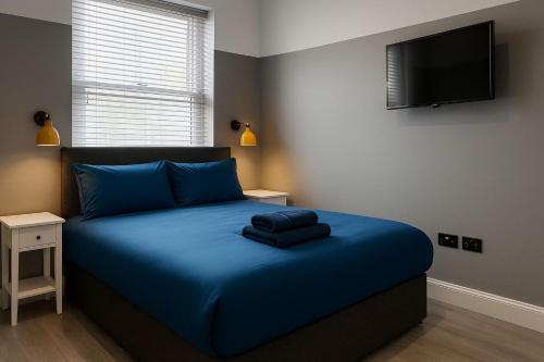 Ένα ή περισσότερα κρεβάτια σε δωμάτιο στο 343 Luxury in Caledonian Central London