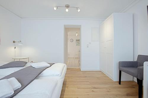 Ένα ή περισσότερα κρεβάτια σε δωμάτιο στο Elisabeth Apartments