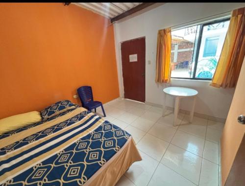 Postel nebo postele na pokoji v ubytování Hospedaje Ocasos- Restaurante Mar de brasas