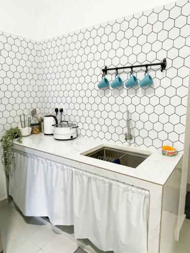 Η κουζίνα ή μικρή κουζίνα στο Rumah Huda