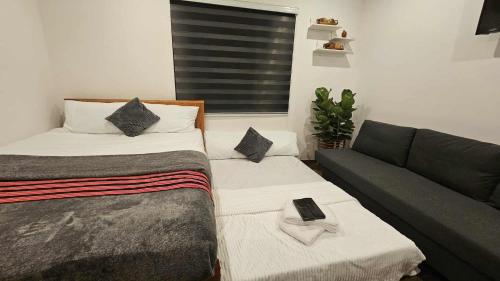 Postel nebo postele na pokoji v ubytování Kordilyera Haven