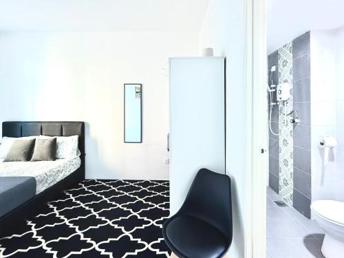 Postel nebo postele na pokoji v ubytování Reality Room Ipoh Centre - Stay With Host