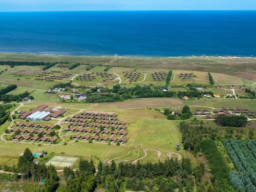 an aerial view of a farm near the ocean at Type2 holiday home in Hanstholm in Hanstholm