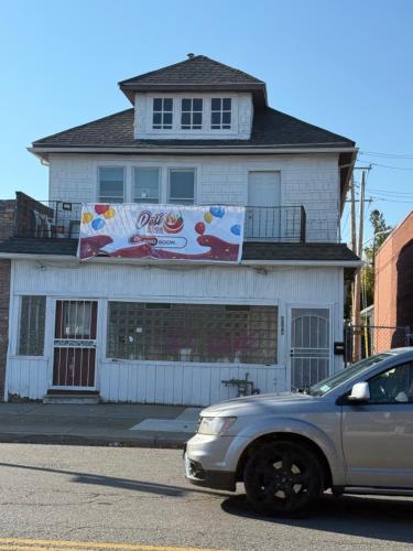 a silver car parked in front of a house at Comfortable 3-BR Home Minutes From UB South & Shop in Buffalo