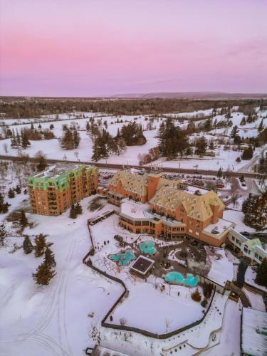 an aerial view of a resort in the snow at Chateau Cartier Hotel & Resort, an Ascend Collection Resort in Gatineau