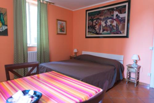 Katil atau katil-katil dalam bilik di Al Cardinale Rooms & Studios
