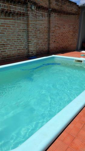 Πισίνα στο ή κοντά στο Pousada familiar com piscina