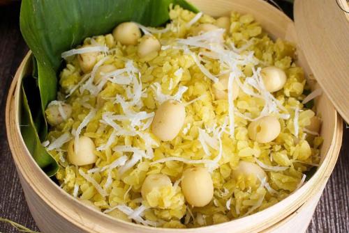 a bowl of rice with eggs and cheese on it at Placement For Cloud Hunting in Suy Tung Su