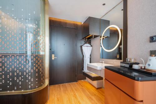 Koupelna v ubytování Licheng Bieyuan Meibao Hotel