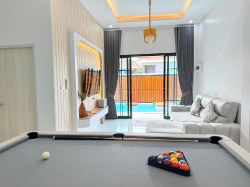 Posezení v ubytování Jaegun Pool VIlla Aonang