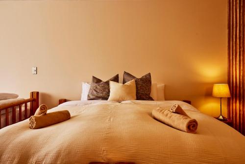 Postel nebo postele na pokoji v ubytování Canopy Lodge - Boutique Lodge at Hakuba Cortina