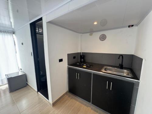 Kuchyň nebo kuchyňský kout v ubytování Apartamentos FM 401