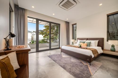 Ένα ή περισσότερα κρεβάτια σε δωμάτιο στο Maya Villa Luxury Garden Pool Villa 630sqm