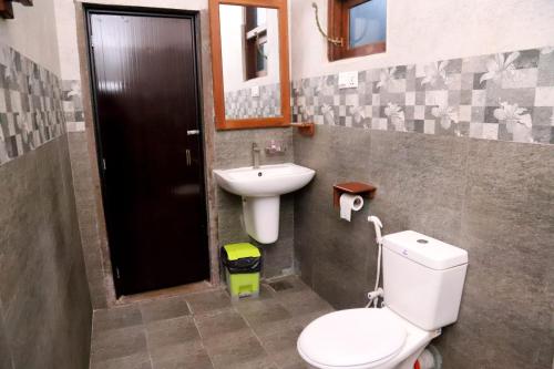 Ένα μπάνιο στο LotusScape Ahangama