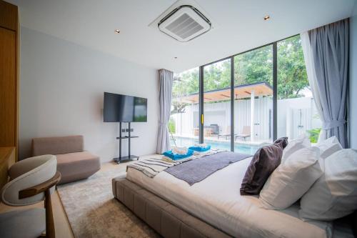 Postel nebo postele na pokoji v ubytování UltraLuxury 4BDR pool villa Botanica Foresta