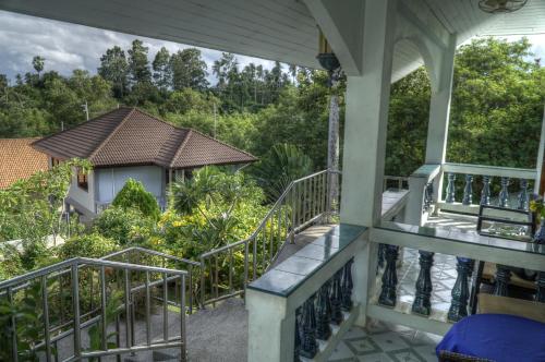 a view from the balcony of a house at Gila's Garden in Lamai