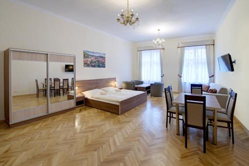 Postel nebo postele na pokoji v ubytování Apartments Paderewski