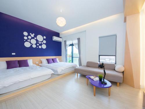 Postel nebo postele na pokoji v ubytování 極簡旅行民宿 Simple Travel B&B