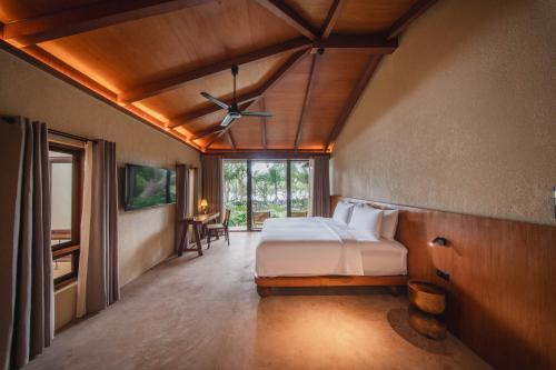 Postel nebo postele na pokoji v ubytování Kira Baya Koh Samed