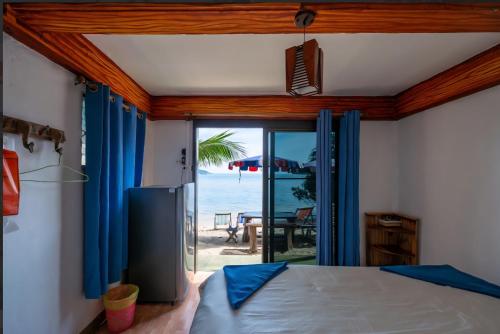 Postel nebo postele na pokoji v ubytování Maya guest house@coffee