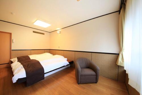 Cama ou camas em um quarto em Yutorelo-an
