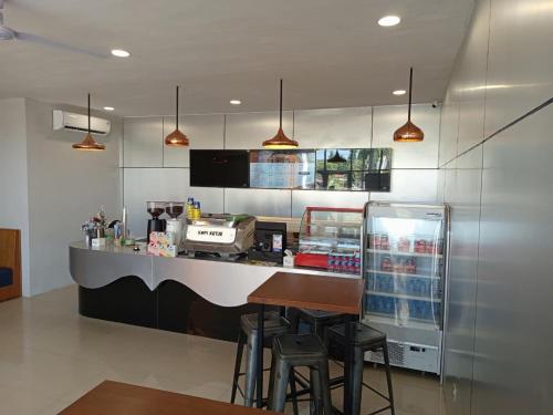 Η κουζίνα ή μικρή κουζίνα στο Ketje Capsule Bandara Raden Inten II