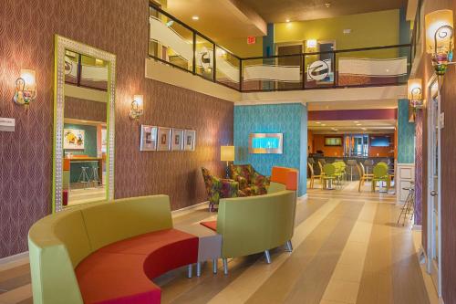 a lobby of a hospital with a waiting room at Clarion Inn & Suites Evansville Eastland Area in Evansville
