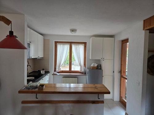 Kuchyň nebo kuchyňský kout v ubytování La MaisonB - Arly