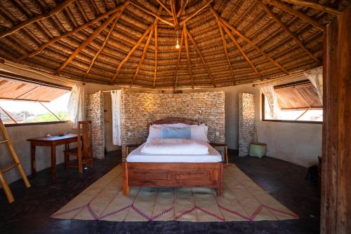 Postel nebo postele na pokoji v ubytování Madagascar Surf Resort