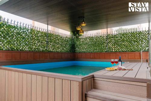 a jacuzziificialificialificialificialificialificialificialificialificialificialificial at StayVista at Moets Palm Villa with BBQ & Bonfire in Gurgaon