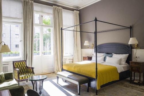 
Ein Bett oder Betten in einem Zimmer der Unterkunft Henri Hotel Berlin Kurfürstendamm
