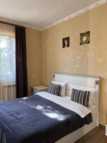 Postel nebo postele na pokoji v ubytování White House